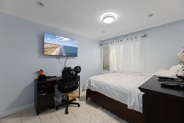 bedroom with light tile patterned flooring and crown molding