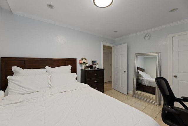 bedroom with light tile patterned floors and ornamental molding