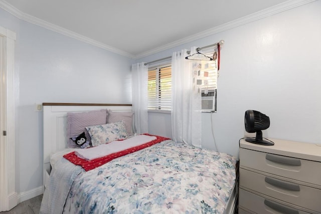 bedroom with cooling unit and ornamental molding