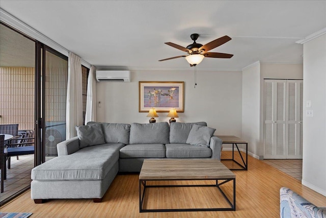 800 S Kihei Rd Unit 504, Kihei, HI 96753 - living room with an AC wall unit, light wood-type flooring, a ceiling fan, crown molding, and baseboards