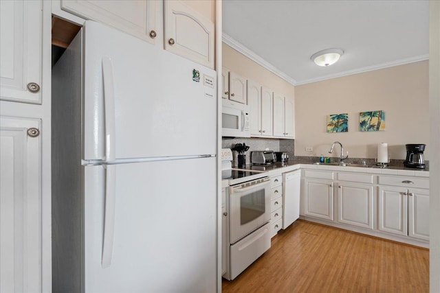 800 S Kihei Rd Unit 504, Kihei, HI 96753 - kitchen featuring white appliances, crown molding, a sink, white cabinetry, and decorative backsplash