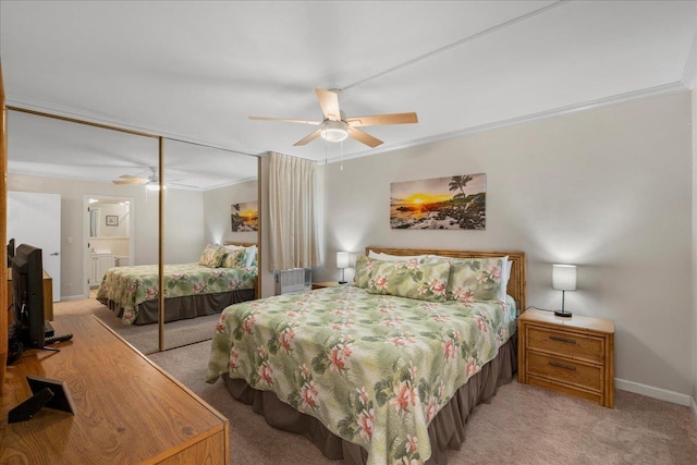 800 S Kihei Rd Unit 504, Kihei, HI 96753 - bedroom featuring a closet, crown molding, light carpet, baseboards, and ceiling fan