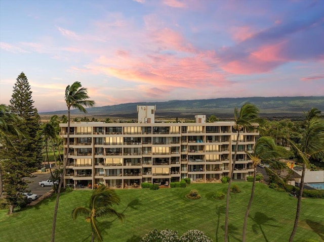 800 S Kihei Rd Unit 504, Kihei, HI 96753 - property at dusk featuring a view of apartment building / complex