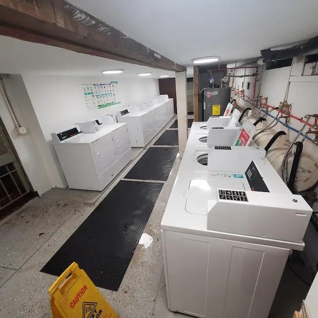 laundry room featuring washer and dryer, washer hookup, and electric water heater