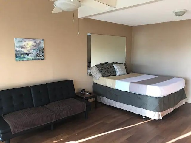 bedroom featuring ceiling fan and hardwood / wood-style floors