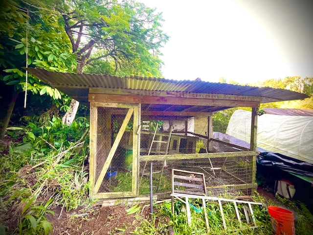 exterior space featuring an outbuilding