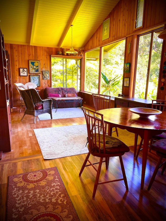 interior space featuring wooden ceiling and lofted ceiling with beams