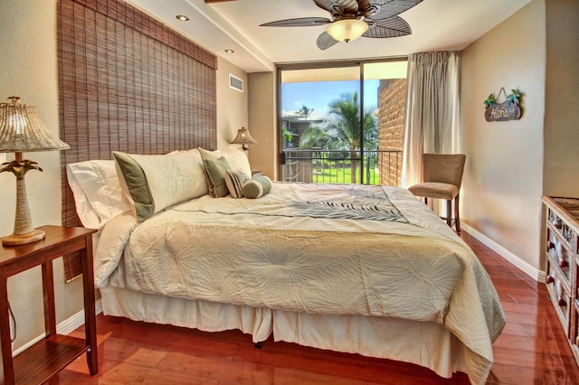 bedroom with access to exterior, ceiling fan, and wood-type flooring