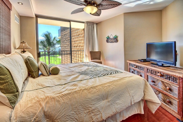 bedroom featuring access to exterior and ceiling fan