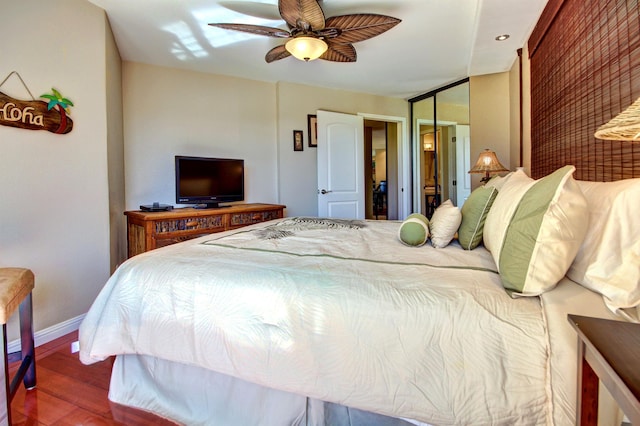 bedroom featuring hardwood / wood-style flooring and ceiling fan