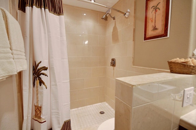 bathroom featuring curtained shower