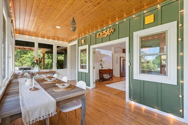 sunroom / solarium with wooden ceiling and a wealth of natural light