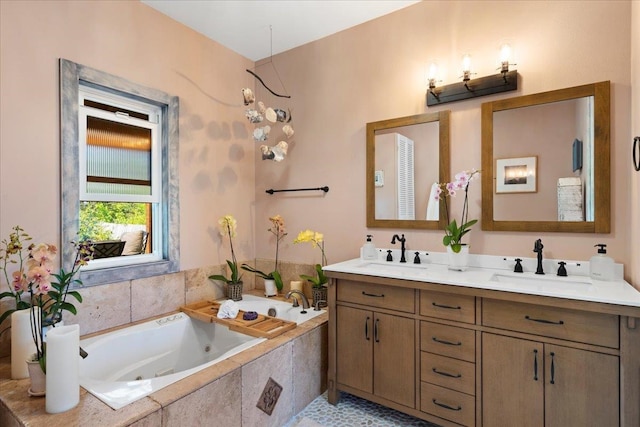 full bathroom featuring a sink, a whirlpool tub, and double vanity