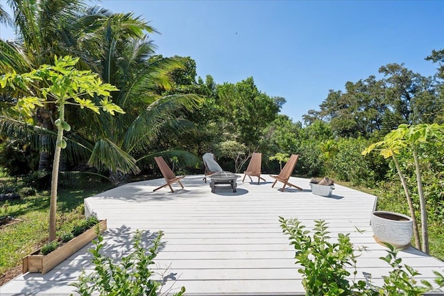 deck with an outdoor fire pit