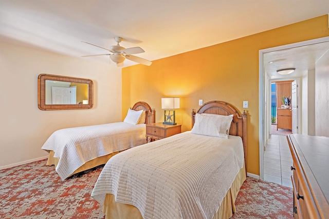 bedroom featuring ceiling fan and light tile patterned floors