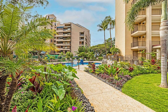 view of home's community with a swimming pool