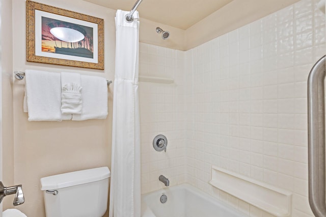 bathroom with shower / bath combo and toilet