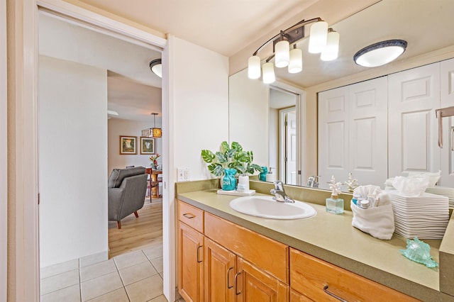 bathroom with vanity and wood-type flooring