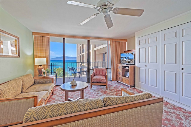 living room featuring ceiling fan