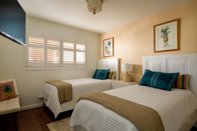 100 Hauoli St Unit 106, Wailuku, HI 96793 - bedroom featuring wood finished floors and baseboards