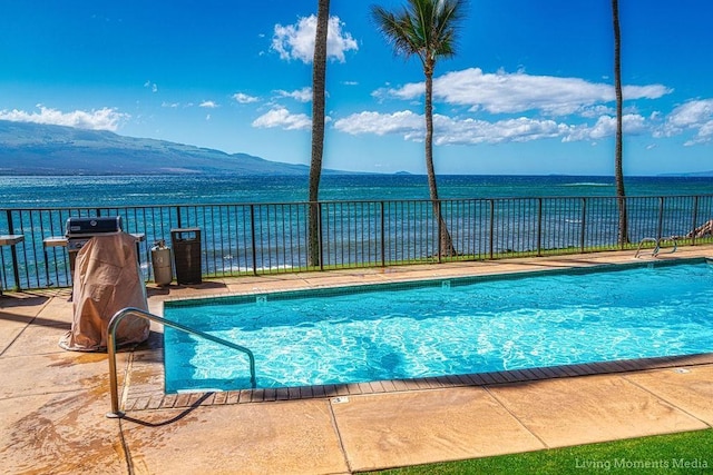 100 Hauoli St Unit 106, Wailuku, HI 96793 - community pool featuring a water and mountain view