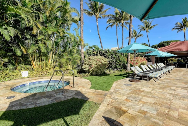 view of swimming pool with a yard, a community hot tub, and a patio area