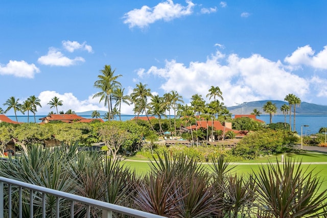 view of community featuring a water and mountain view