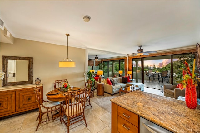 dining room featuring ceiling fan and light tile patterned floors