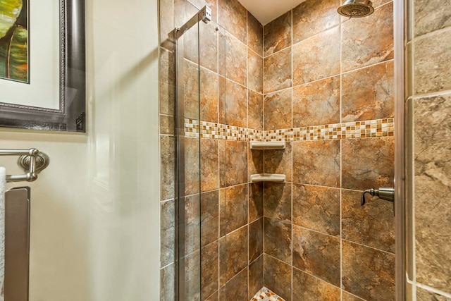 bathroom featuring an enclosed shower