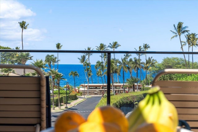 balcony featuring a water view