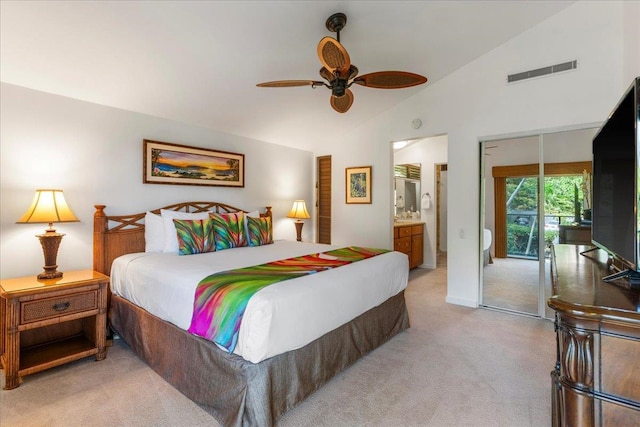 bedroom with ceiling fan, access to outside, lofted ceiling, light carpet, and ensuite bathroom