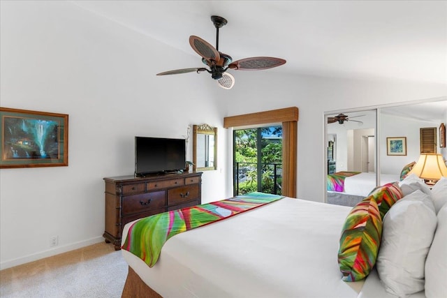 bedroom featuring vaulted ceiling, light carpet, ceiling fan, and a closet