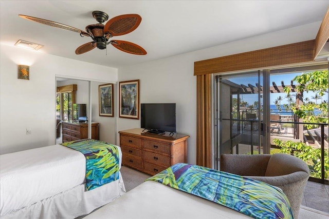 3600 Wailea Alanui Dr Unit 708, Kihei, HI 96753 - bedroom featuring ceiling fan, a closet, and access to outside