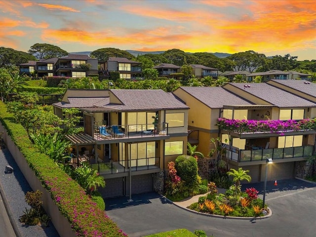 outdoor building at dusk with a mountain view