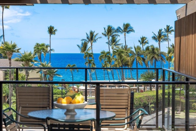 balcony featuring a water view