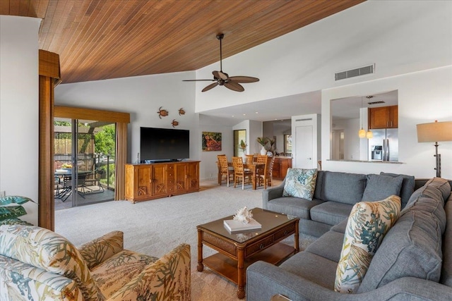 living room with wood ceiling, ceiling fan, light colored carpet, and high vaulted ceiling