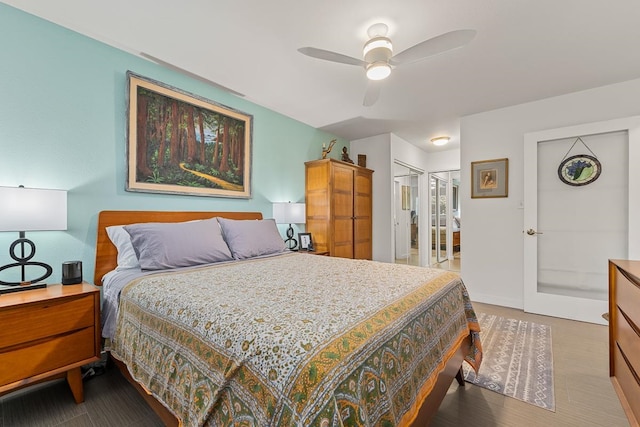 bedroom featuring ceiling fan and hardwood / wood-style floors