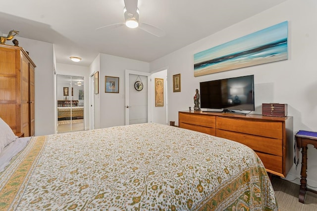 bedroom with ceiling fan and ensuite bath