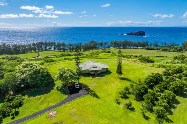 drone / aerial view featuring a rural view and a water view