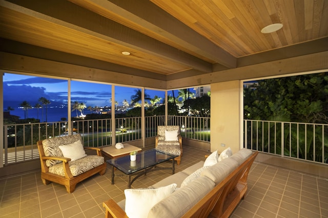 sunroom / solarium with beam ceiling and wooden ceiling