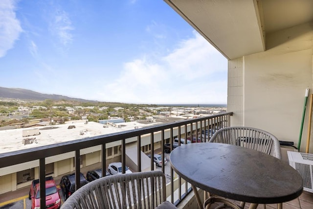 balcony featuring a mountain view