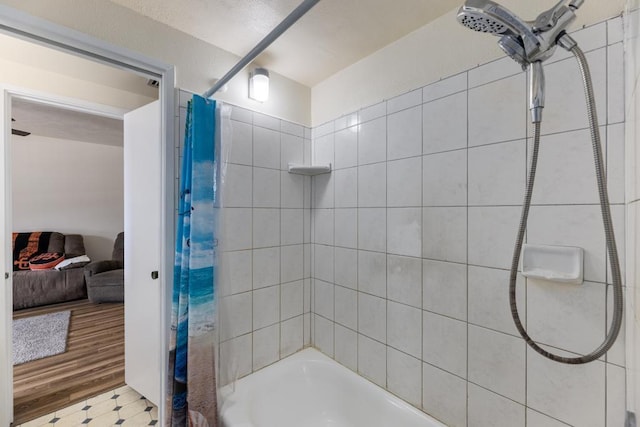 bathroom featuring shower / bathtub combination with curtain