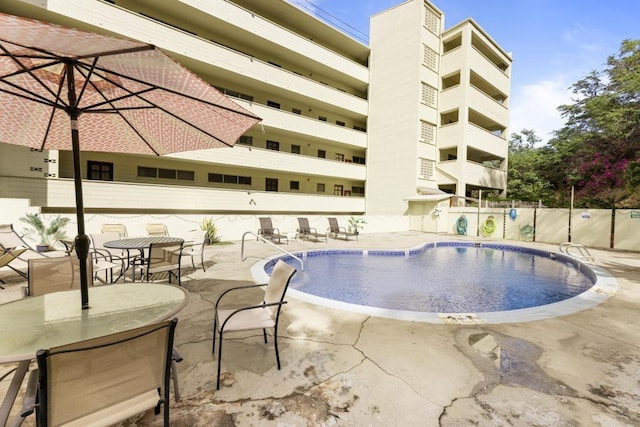 view of pool with a patio