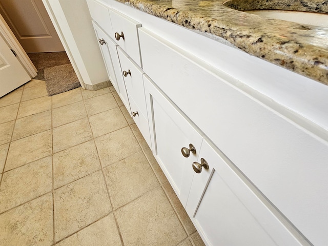 interior details featuring tile patterned floors