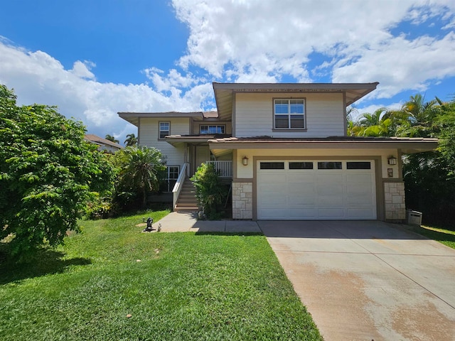 front facade featuring a garage and a front yard