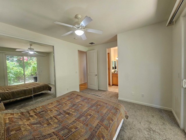 unfurnished bedroom with light carpet, connected bathroom, and ceiling fan