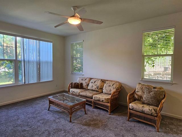 carpeted living room featuring ceiling fan