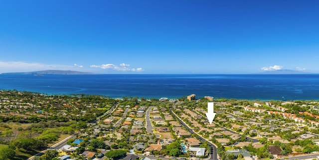 aerial view featuring a water and mountain view