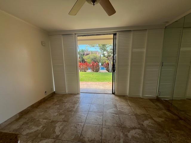 3959 Lower Honoapiilani Rd Unit 304, Lahaina, HI 96761 - doorway to outside with a ceiling fan