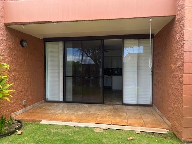 3959 Lower Honoapiilani Rd Unit 304, Lahaina, HI 96761 - view of exterior entry featuring a patio